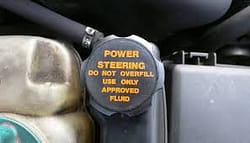 power steering fluid storage